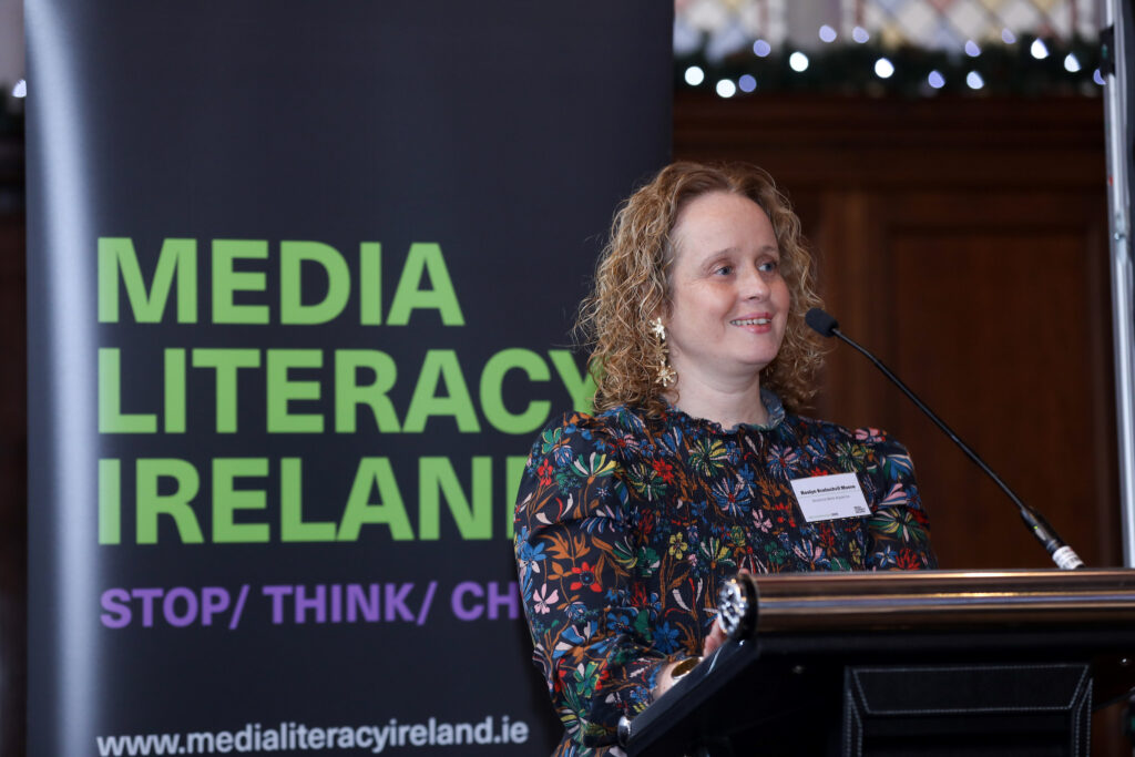 Photo of Roslyn Kratochvil Moore, Deutsche Welle Akademie at podium.
